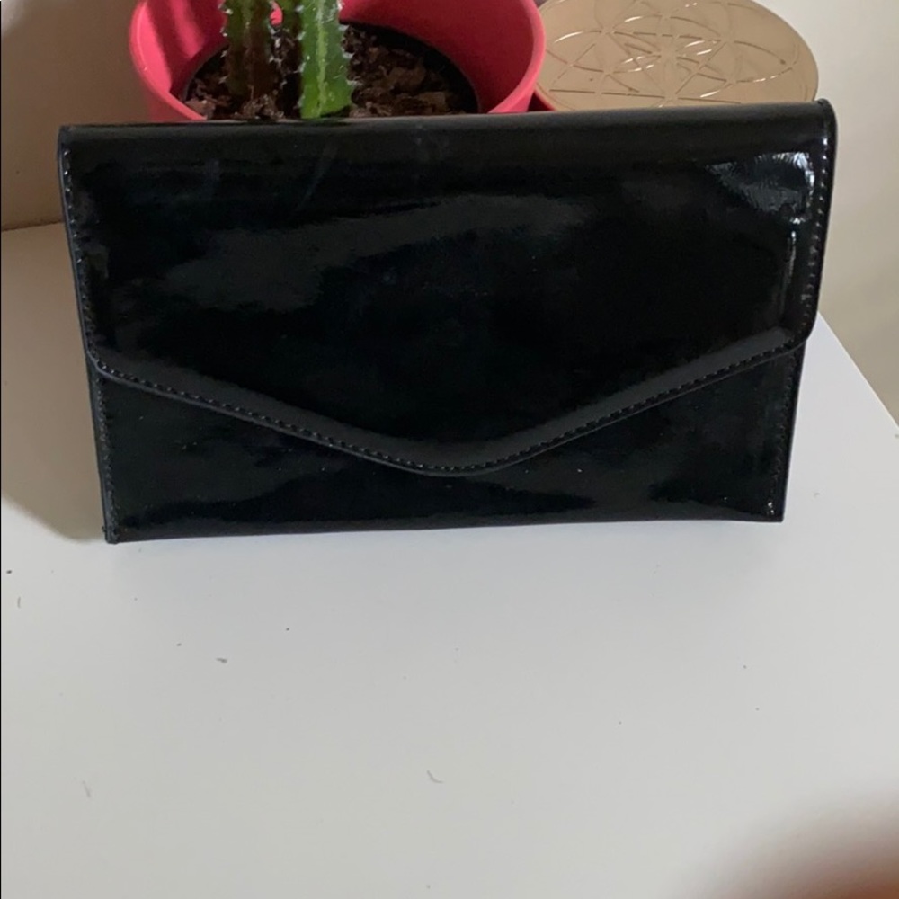 Black clutch. Barely worn